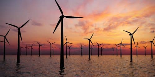 Offshore,Wind,Turbines,Farm,At,Sunset